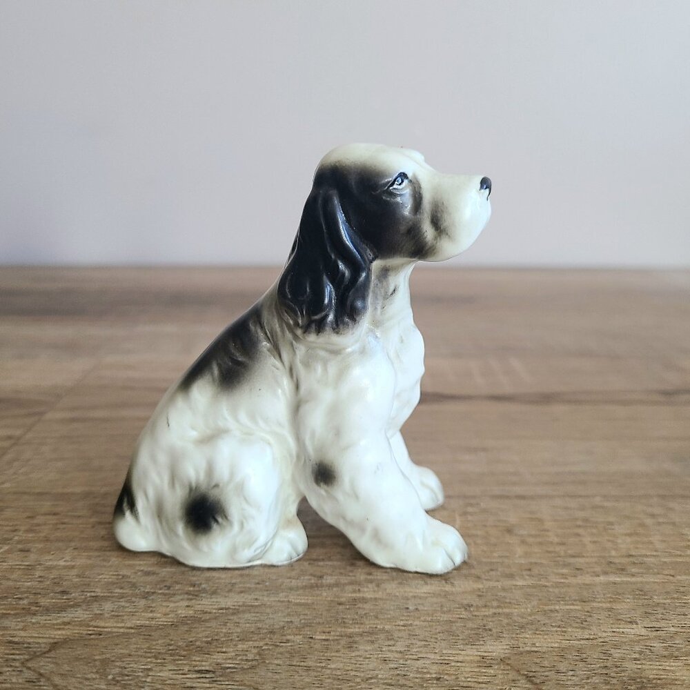 Vintage porcelain Spaniel dogs figurine.